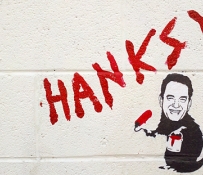 Hanksy = Banksy + Tom Hanks